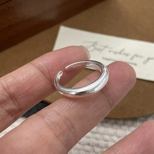 Close-up of S925 sterling silver ring showing the inner material hallmark and polish