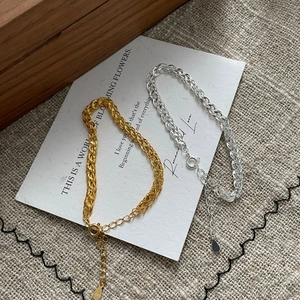 Detail of S925 sterling silver woven bracelets with lobster clasp and adjustable chain