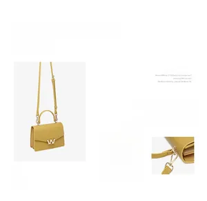 Close-up of yellow PU leather crossbody bag featuring a golden W-shaped metal buckle