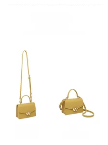 Detail view of mustard yellow PU leather crossbody bag featuring metal W logo and top handle