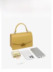 Internal view of yellow PU leather crossbody bag showing large storage capacity