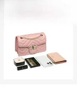 Pink quilted PU leather crossbody bag interior showing spacious daily essentials capacity