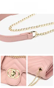 Detailed view of pink quilted PU leather crossbody bag with V-stitch and gold hardware