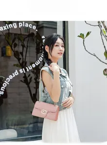 Pink PU leather crossbody bag with V-quilted pattern and golden chain strap for women