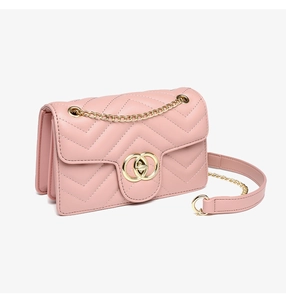 Detail view of pink quilted PU leather bag with golden chain strap and round lock