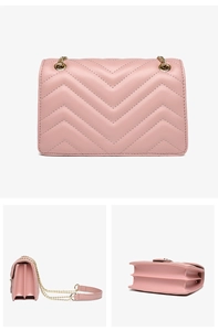 Detail view of pink quilted PU leather handbag with gold chain strap and multi-layer structure