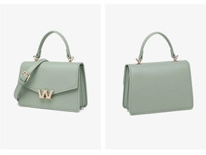 Detail view of mint green PU leather small square crossbody bag with gold W metal logo