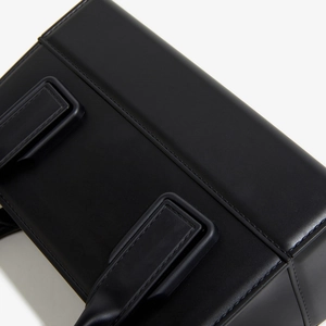 Close-up of PVC square jelly bag featuring large decorative buckle and matte finish