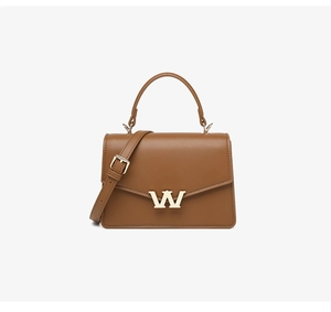 Detailed view of caramel brown PU leather crossbody bag with golden W-shaped clasp
