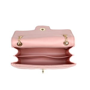 Quilted light pink crossbody bag with gold chain strap and three interior compartments