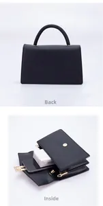 Detailed back view and interior storage capacity of a black minimalist leather crossbody bag