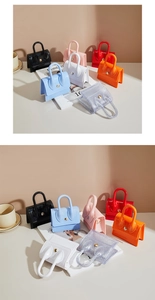 Close-up of mini PVC jelly bags in multiple colors with metallic magnetic closure