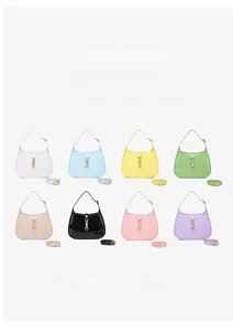 Detail showing eight available colors of the crescent PU leather shoulder bag with gold clasp