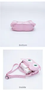 Pink cat-shaped silicone crossbody bag showing bottom thickness and interior capacity