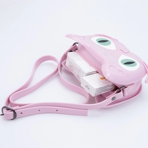 Pink cartoon cat silicone crossbody bag for girls showing interior storage capacity