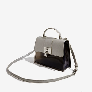 Minimalist grey cross-grain and translucent patchwork crossbody bag with silver lock