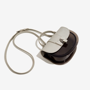 Translucent brown PU leather saddle bag with top handle and adjustable shoulder strap