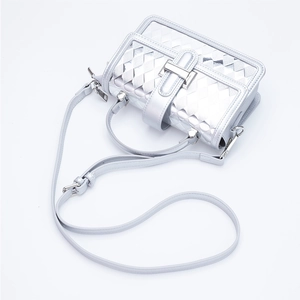 Silver geometric quilted PU leather handbag with top handle and adjustable strap