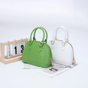 Green and white shell handbags with woven texture and double handles for women