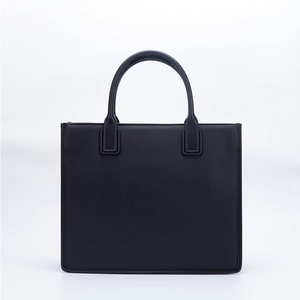 Minimalist black PU leather tote bag with sturdy top handles and premium stitching