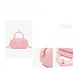 Detailed view of pink jelly handbag featuring heart-shaped joints and golden chain strap