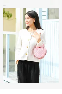 Pink heart-shaped quilted PVC jelly handbag paired with a white tweed jacket for ladies