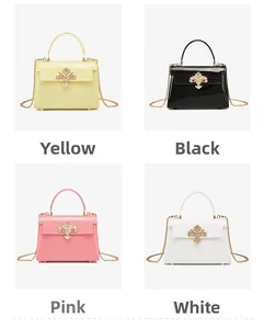 Mini sacs à main en PVC en quatre couleurs avec bandoulières dorées et boucles florales