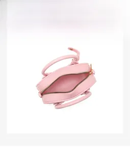 Top view of pink PVC jelly bag showing its compact interior capacity and double zippers
