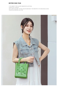 Close-up of bright green PVC jelly tote bag featuring fashion cutout hole design and handles
