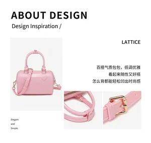 Macro detail of light pink PVC jelly Boston bag showing gold hardware and smooth zipper