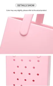 Nahaufnahme der rosa PVC-Strandtasche mit Nietverbindung und runden Belüftungslöchern