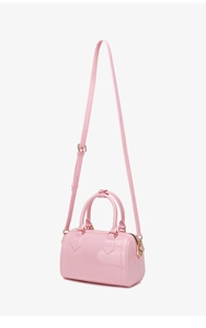 Detailed close-up of pink PVC jelly handbag with golden hardware and adjustable strap