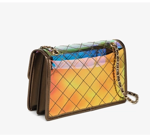 Detailed macro view of holographic diamond quilted PVC bag with multi-color metallic finish