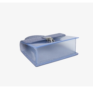 Detail of blue translucent PVC jelly bag featuring a silver metal twist lock closure