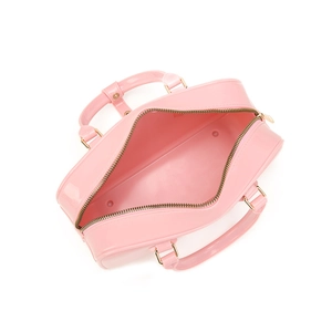 Elegante bolso de mano rosa de PVC tipo jelly con cremallera y detalles metálicos dorados