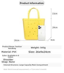 Detailed view of yellow PVC beach bag showing dimensions 26x9x24cm and hollow star patterns