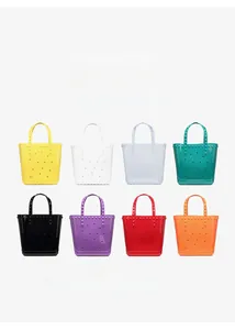 Detail of PVC hollow tote bags featuring rivet handles and X-shaped cutout patterns in 8 colors