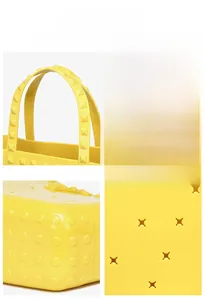 Detail view of yellow beach bag featuring pyramid studs and star-shaped cutouts