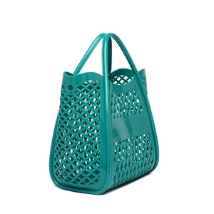 Peacock green PVC woven hollow beach bag with large capacity and waterproof design