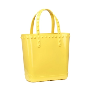 Fashionable bright yellow PVC jelly tote bag with pyramid studs for beach and daily wear