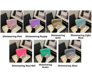Detailed grid of small glitter cosmetic bags in seven vibrant colors with zip closure