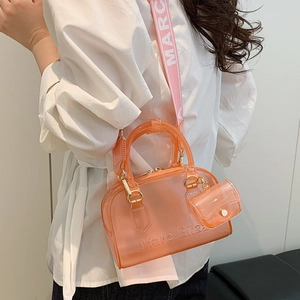 Borsa Boston trasparente in PVC rosa con mini pochette e tracolla larga in tessuto