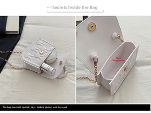 Detail showing the white mini rabbit bag interior with chain strap and small items