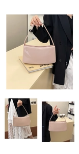 Detalle de bolso de hombro en charol rosa claro con acabado brillante y asa elegante