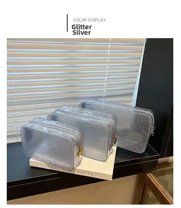 Three-piece silver glitter transparent cosmetic bags with heart-shaped metal zippers