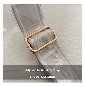 Close-up of the adjustable shoulder strap with gold metal buckle on the PVC jelly bag