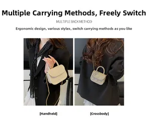 Detail of cute rabbit embossed girls' crossbody bag showing handheld and chain strap styles