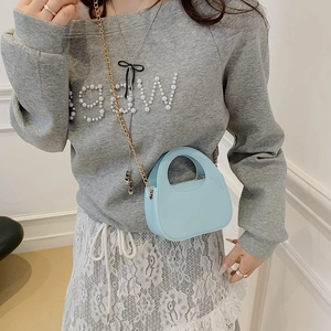 Minimalist light blue semi-circle mini handbag with golden chain strap for women