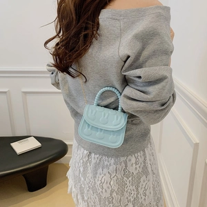 Cute light blue silicone girls handbag with rabbit embossment and beaded handle