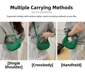 Green crescent bag detail showing versatile shoulder, crossbody and handheld styling options